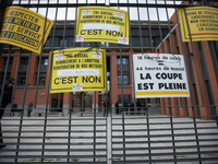 Teachers has put placards on the metal gates of the Local Board Education of toulouse. Several schoolteachers unions and two students unions...