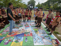 Students play in the Back to School Campaign held by the Sayangi Tunas Cilik Foundation (STC) at Vatulemo Field, Palu, Central Sulawesi, Ind...