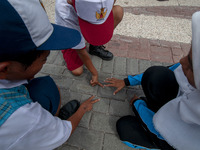 Students play in the Back to School Campaign held by the Sayangi Tunas Cilik Foundation (STC) at Vatulemo Field, Palu, Central Sulawesi, Ind...