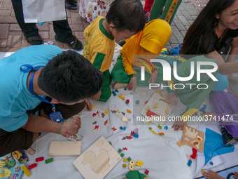 Students play in the Back to School Campaign held by the Sayangi Tunas Cilik Foundation (STC) at Vatulemo Field, Palu, Central Sulawesi, Ind...