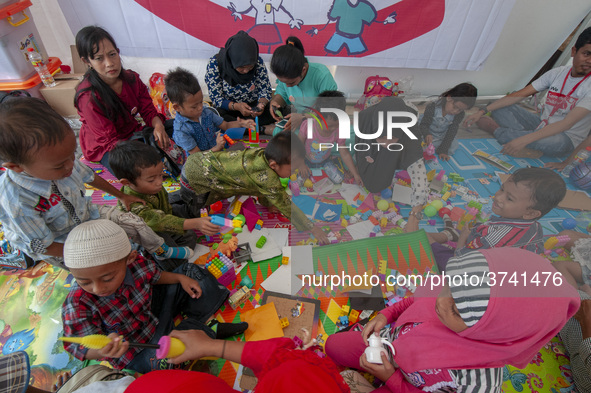 Students play in the Back to School Campaign held by the Sayangi Tunas Cilik Foundation (STC) at Vatulemo Field, Palu, Central Sulawesi, Ind...