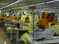 Workers at a garment factory work at MB Knit garment factory in Narayanganj, near Dhaka. (