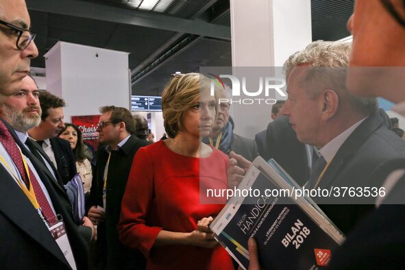 President of the Ile-de France regional council Valerie Pecresse (C, in red) visits the Salon des Entrepreneurs (Entrepreneurship fair) in P...