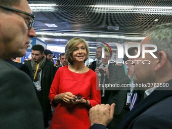 President of the Ile-de France regional council Valerie Pecresse (C, in red) speaks with the President of the Hauts-de-France region, Xavier...