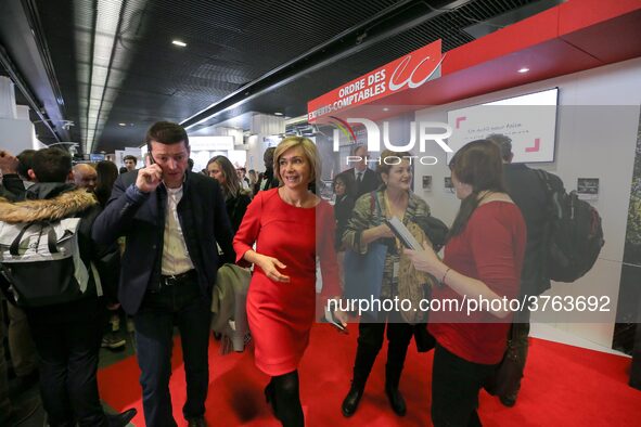 President of the Ile-de France regional council Valerie Pecresse (C, in red) visits the Salon des Entrepreneurs (Entrepreneurship fair) in P...