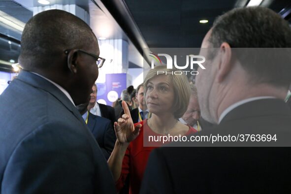 President of the Ile-de France regional council Valerie Pecresse (C, in red) visits the Salon des Entrepreneurs (Entrepreneurship fair) in P...