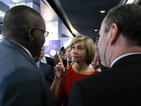 President of the Ile-de France regional council Valerie Pecresse (C, in red) visits the Salon des Entrepreneurs (Entrepreneurship fair) in P...