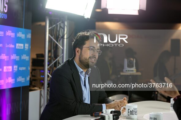 French Junior Minister for the Digital Sector attached to Finance Minister in charge of Public Action and Accounts Mounir Mahjoubi (C) visit...