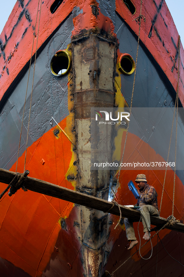 A young man (welder) works at a shipyard in Dhaka, Bangladesh, Februay 7,2019 