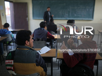 Deaf Palestinian students in Gaza get lessons in their classroom at first school in Palestine care with them, on 10 February 2019. (