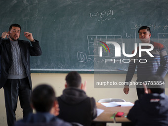 Deaf Palestinian students in Gaza get lessons in their classroom at first school in Palestine care with them, on 10 February 2019. (