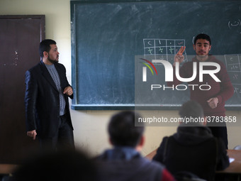 Deaf Palestinian students in Gaza get lessons in their classroom at first school in Palestine care with them, on 10 February 2019. (