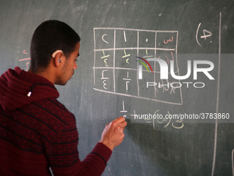 Deaf Palestinian students in Gaza get lessons in their classroom at first school in Palestine care with them, on 10 February 2019. (