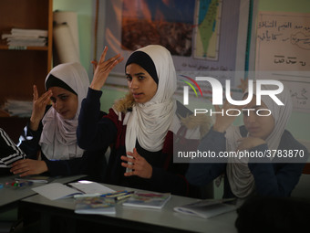 Deaf Palestinian students in Gaza get lessons in their classroom at first school in Palestine care with them, on 10 February 2019. (