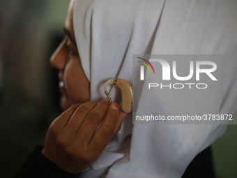 Deaf Palestinian students in Gaza get lessons in their classroom at first school in Palestine care with them, on 10 February 2019. (