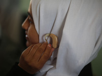 Deaf Palestinian students in Gaza get lessons in their classroom at first school in Palestine care with them, on 10 February 2019. (