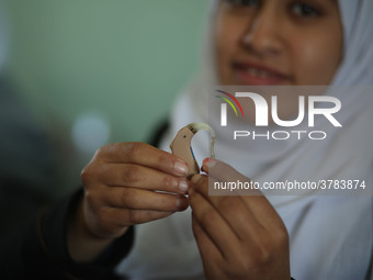 Deaf Palestinian students in Gaza get lessons in their classroom at first school in Palestine care with them, on 10 February 2019. (