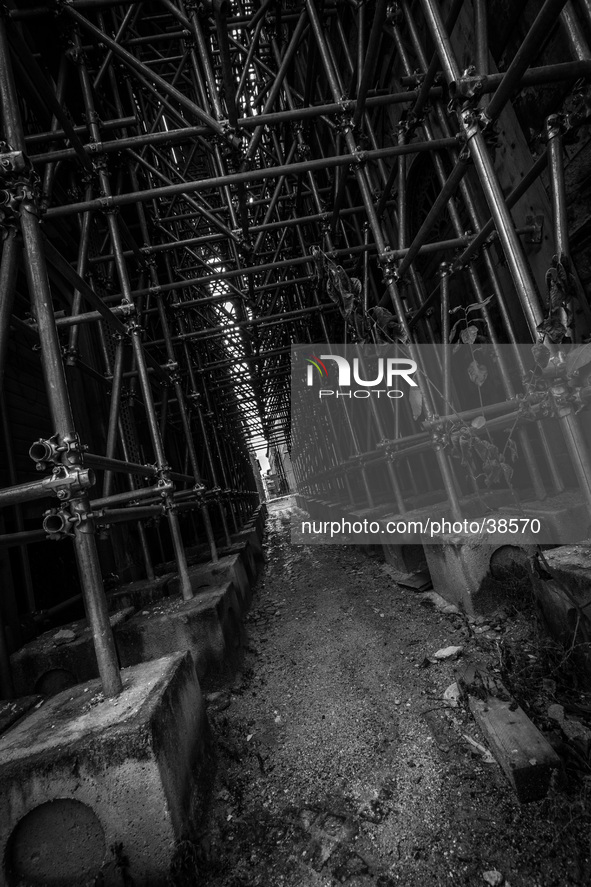 Scaffolding in the historic center of L'Aquila City, on January 11, 2014. 