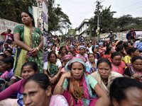 The cooks and helpers of Mid Day Meals of All Assam Secondary Schools held a protest demonstration against handing over the running of mid d...