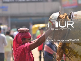 An Indian women works at a constructions site on the eve of International Women’s Day in Dimapur, India North eastern state of Nagaland on T...