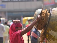 An Indian women works at a constructions site on the eve of International Women’s Day in Dimapur, India North eastern state of Nagaland on T...