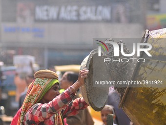 An Indian women works at a constructions site on the eve of International Women’s Day in Dimapur, India North eastern state of Nagaland on T...