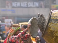 An Indian women works at a constructions site on the eve of International Women’s Day in Dimapur, India North eastern state of Nagaland on T...