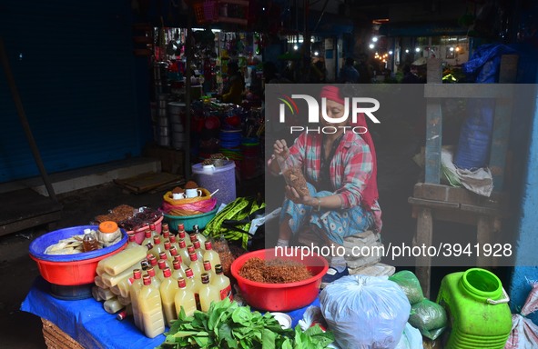 A Woman sells vegetables on the street on the eve of International Women’s Day in Dimapur,  India North eastern state of Nagaland on Thursda...