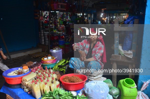 A Woman sells vegetables on the street on the eve of International Women’s Day in Dimapur,  India North eastern state of Nagaland on Thursda...