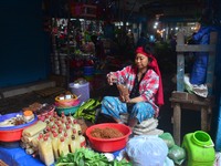 A Woman sells vegetables on the street on the eve of International Women’s Day in Dimapur,  India North eastern state of Nagaland on Thursda...