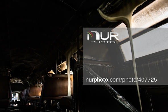 A burned and abandoned train coach used by homeless, in Novara, Italy.  Exporti is a reality tale made up out of mistakes and powerlessness....