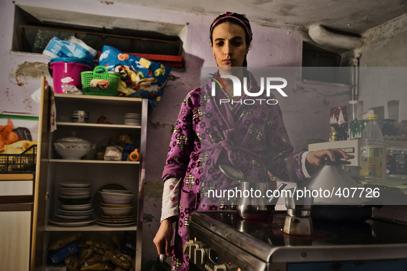 Adsaoui Elbouchtaouia in the maintime she is preparing tea, in Novara, Italy.  Exporti is a reality tale made up out of mistakes and powerle...