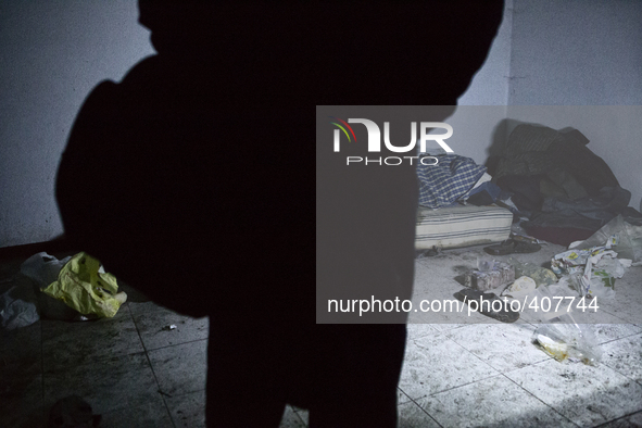 Abdul silhouette in front of his bed, in Novara, Italy.  Exporti is a reality tale made up out of mistakes and powerlessness. Exporti is an...