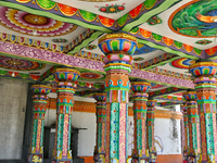 Colorful patterns and religious symbols adorn the columns at the Madduvil Panriththalaichchi Amman Kovil (Madduvil Panriththalachchi Amman H...