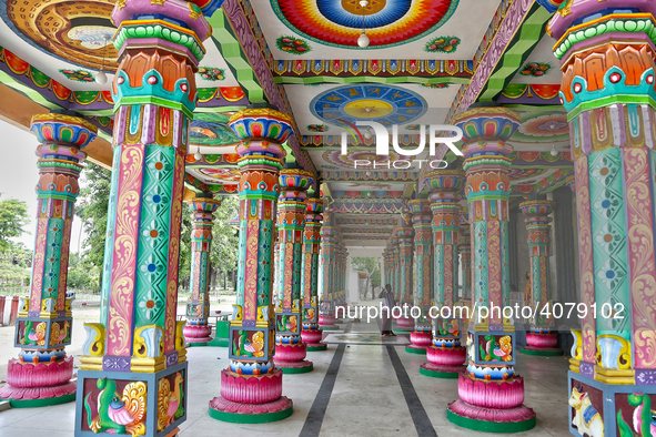 Colorful patterns and religious symbols adorn the columns at the Madduvil Panriththalaichchi Amman Kovil (Madduvil Panriththalachchi Amman H...