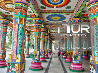 Colorful patterns and religious symbols adorn the columns at the Madduvil Panriththalaichchi Amman Kovil (Madduvil Panriththalachchi Amman H...