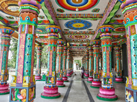 Colorful patterns and religious symbols adorn the columns at the Madduvil Panriththalaichchi Amman Kovil (Madduvil Panriththalachchi Amman H...