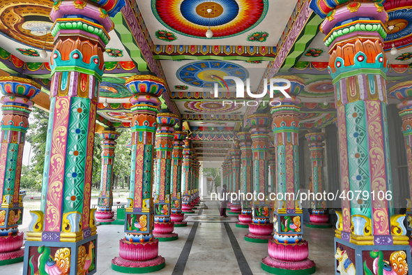 Colorful patterns and religious symbols adorn the columns at the Madduvil Panriththalaichchi Amman Kovil (Madduvil Panriththalachchi Amman H...