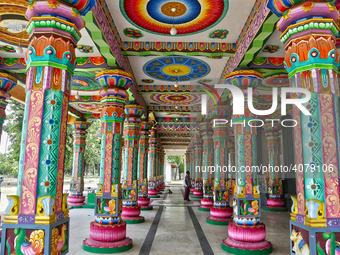 Colorful patterns and religious symbols adorn the columns at the Madduvil Panriththalaichchi Amman Kovil (Madduvil Panriththalachchi Amman H...