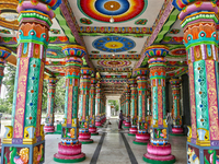 Colorful patterns and religious symbols adorn the columns at the Madduvil Panriththalaichchi Amman Kovil (Madduvil Panriththalachchi Amman H...