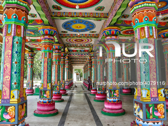 Colorful patterns and religious symbols adorn the columns at the Madduvil Panriththalaichchi Amman Kovil (Madduvil Panriththalachchi Amman H...