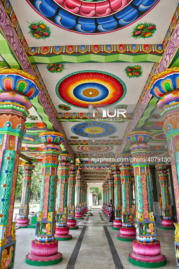 Colorful patterns and religious symbols adorn the columns at the Madduvil Panriththalaichchi Amman Kovil (Madduvil Panriththalachchi Amman H...