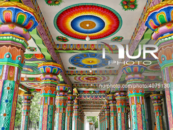 Colorful patterns and religious symbols adorn the columns at the Madduvil Panriththalaichchi Amman Kovil (Madduvil Panriththalachchi Amman H...