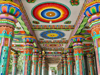 Colorful patterns and religious symbols adorn the columns at the Madduvil Panriththalaichchi Amman Kovil (Madduvil Panriththalachchi Amman H...