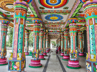 Colorful patterns and religious symbols adorn the columns at the Madduvil Panriththalaichchi Amman Kovil (Madduvil Panriththalachchi Amman H...