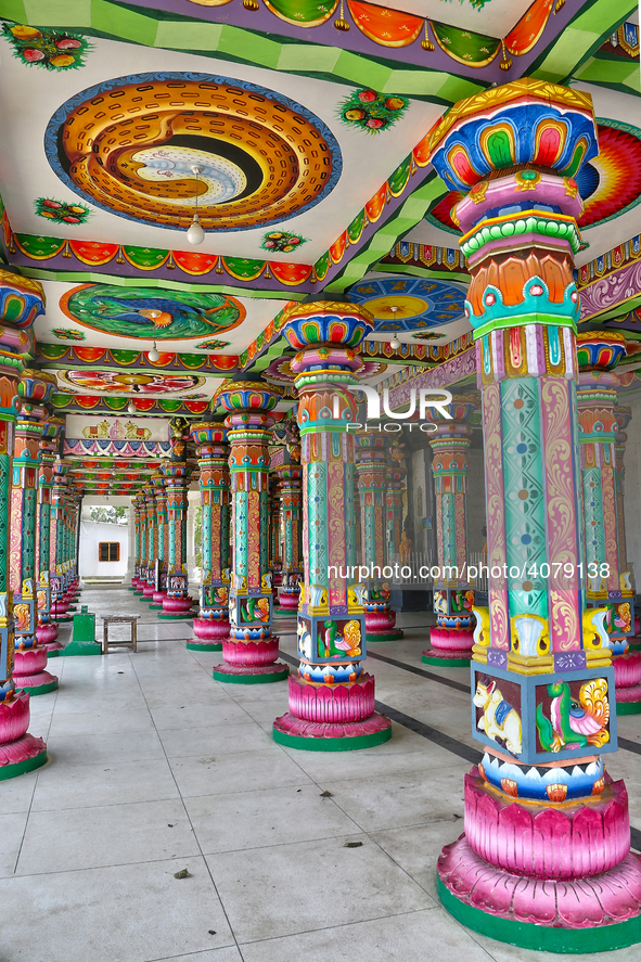 Colorful patterns and religious symbols adorn the columns at the Madduvil Panriththalaichchi Amman Kovil (Madduvil Panriththalachchi Amman H...