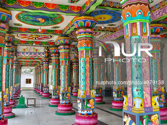 Colorful patterns and religious symbols adorn the columns at the Madduvil Panriththalaichchi Amman Kovil (Madduvil Panriththalachchi Amman H...