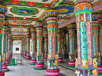 Colorful patterns and religious symbols adorn the columns at the Madduvil Panriththalaichchi Amman Kovil (Madduvil Panriththalachchi Amman H...