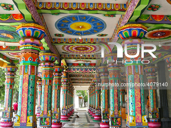 Colorful patterns and religious symbols adorn the columns at the Madduvil Panriththalaichchi Amman Kovil (Madduvil Panriththalachchi Amman H...