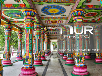 Colorful patterns and religious symbols adorn the columns at the Madduvil Panriththalaichchi Amman Kovil (Madduvil Panriththalachchi Amman H...